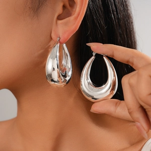 Polished silver teardrop earrings for women with minimalist water drop metal design