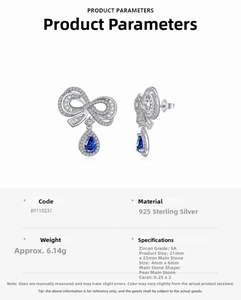 Macro detail of S925 silver bow earrings with blue pear gemstones and 5A cubic zirconia