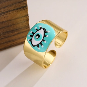 Detailed macro view of 18K gold plated evil eye ring with turquoise enamel inlay