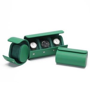 Detail of green litchi grain leather watch cases in single and triple slot storage rolls