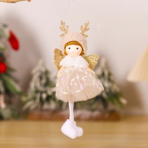 Detailed view of plush angel ornament with sequined skirt and golden wings on Christmas tree