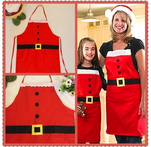 Detail of Christmas Santa aprons for adults and kids featuring red fabric and belt design
