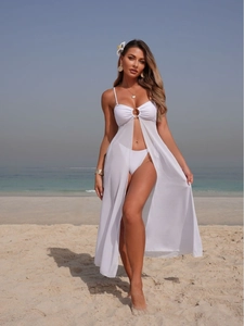 White two-piece bikini with sheer mesh high-slit long dress and metal buckle detail