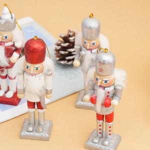 Detail of 12cm wooden Christmas nutcracker soldiers with glitter and hanging ropes