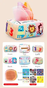 Detail view of baby sensory tissue box with colorful scarves and crinkle educational paper