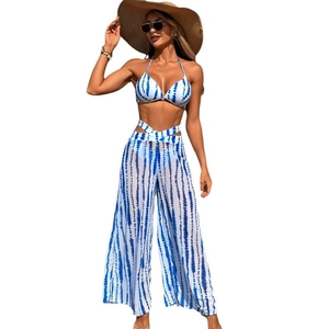 Three-piece bikini set with blue tie-dye print and mesh wide-leg cover-up pants
