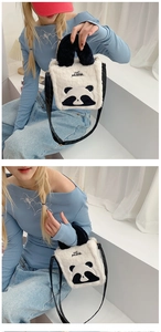 Detail of cute panda plush bag with PANDA embroidery and soft faux fur texture