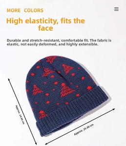 Flat lay view showing 24cm height and 25cm width dimensions of this knit Christmas beanie