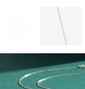 Macro detail of fine S925 sterling silver chain links with smooth metallic luster