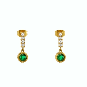 Detail of vintage gold earrings featuring four white pearls and a green gemstone drop