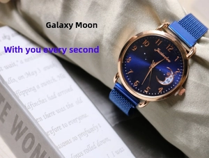 Detail of rose gold quartz watch with blue starry sky dial and moon pattern mesh band
