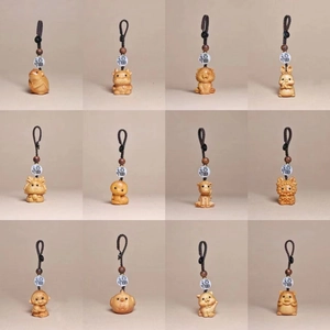 Handcrafted wooden Chinese zodiac keychains set featuring 12 animal signs with fortune beads