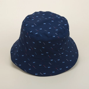Reversible navy blue bucket hat with bowtie print and narrow brim for summer sun protection