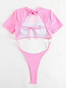Pink monokini swimsuit with cutout waist, metal ring details and lace-up back design