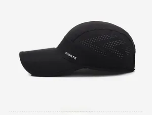 Detail view of black quick-dry sports cap featuring laser-cut side ventilation holes