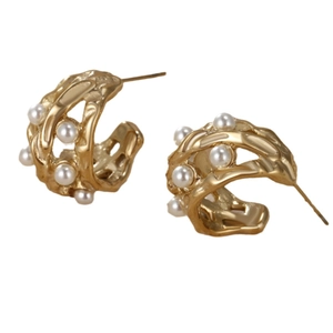 Golden hollow-out irregular lava-textured earrings with white pearls for women