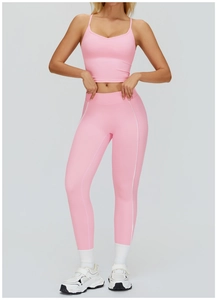 Ensemble de yoga rose avec brassière col en V et legging taille haute à rayures latérales
