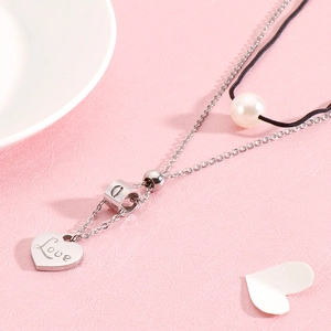 Double-layer stainless steel necklace featuring silver heart love pendant and white pearl