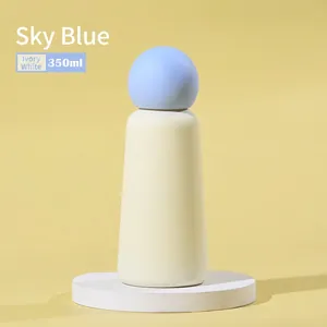 Bouteille isotherme minimaliste 350ml avec couvercle bleu ciel et corps blanc ivoire