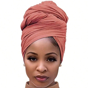 Ethnic style stretch turban in salmon orange color with elegant pleated texture