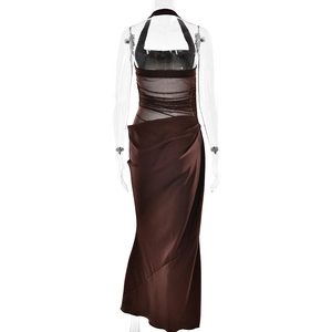 Detail view of backless halter satin maxi dress with sheer mesh paneling in deep brown