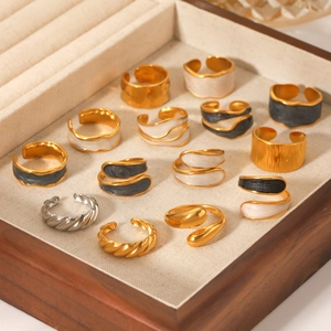 Detailed collection of gold and silver tarnish-free stainless steel rings with enamel accents