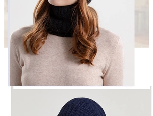 Details zum warmen schwarzen Strickschal und der dunkelblauen Wintermütze im Set
