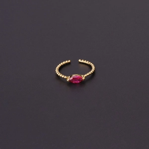 Detail of gold beaded ring with marquise-cut magenta stone and adjustable open band