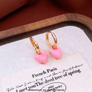 French vintage style heart earrings with pink enamel drops and golden hoops