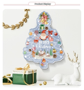 Detailed view of a blue 3D Christmas tree wall sticker with Merry Christmas lettering