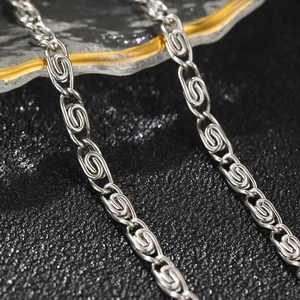 Polished silver stainless steel necklace with double helix links and geometric design