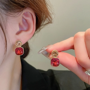 Vintage geometric earrings with champagne and red crystals in a gold beaded setting