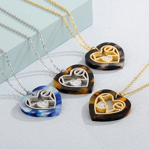 Fashion heart pendants with shell texture and love engraving in gold and silver plating