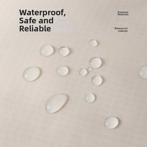 Macro shot of high-density waterproof beige fabric with water droplets on the surface
