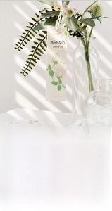 Macro view of embossed specialty paper bookmarks with floral patterns and relief texture