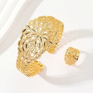 Exquisite gold-plated hollow leaf bridal jewelry set with open bangle and matching ring