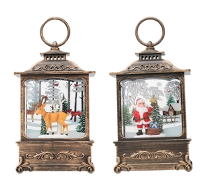 Detail of vintage bronze Christmas lanterns with reindeer and Santa Claus snow scenes
