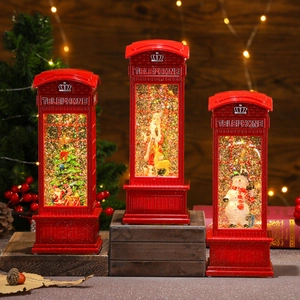 Lighted musical Christmas telephone booth snow globe with Santa and Snowman decor