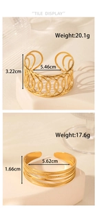 Detail view of wide gold stainless steel bangles with mesh and layered designs