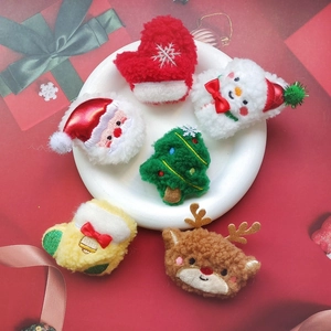 Set of 6 Christmas plush accessories including Santa, Snowman and Reindeer on a plate