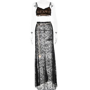 Detailed view of black floral lace fabric and gold chain belt on a sheer fishtail skirt