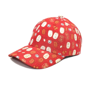 Red baseball cap with Chinese seal print and lucky characters on a white background