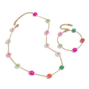 Bohemian gold stainless steel jewelry set with colorful floral charms for women