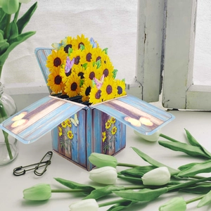 Detailed 3D pop-up card box featuring colorful sunflowers and vibrant paper butterflies