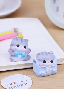 Miniature gray cat figurines set for desk decor featuring a kitten in a blue shopping bag