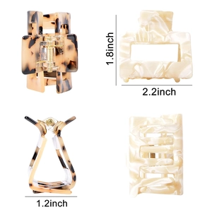 Detail showing acetate hair claw clip set with dimensions in inches and marble pattern