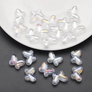Macro shot of 10x14mm butterfly glass beads with AB iridescent finish for jewelry DIY