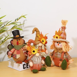 Thanksgiving turkey, scarecrow and autumn gnomes set for festive tabletop decoration