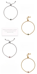 Detailed shot of adjustable gold and silver birthstone bolo bracelets with emerald and moonstone