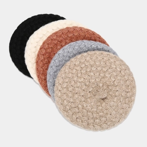 Group of 5 vintage knitted beret hats in various colors with thick woven textures
